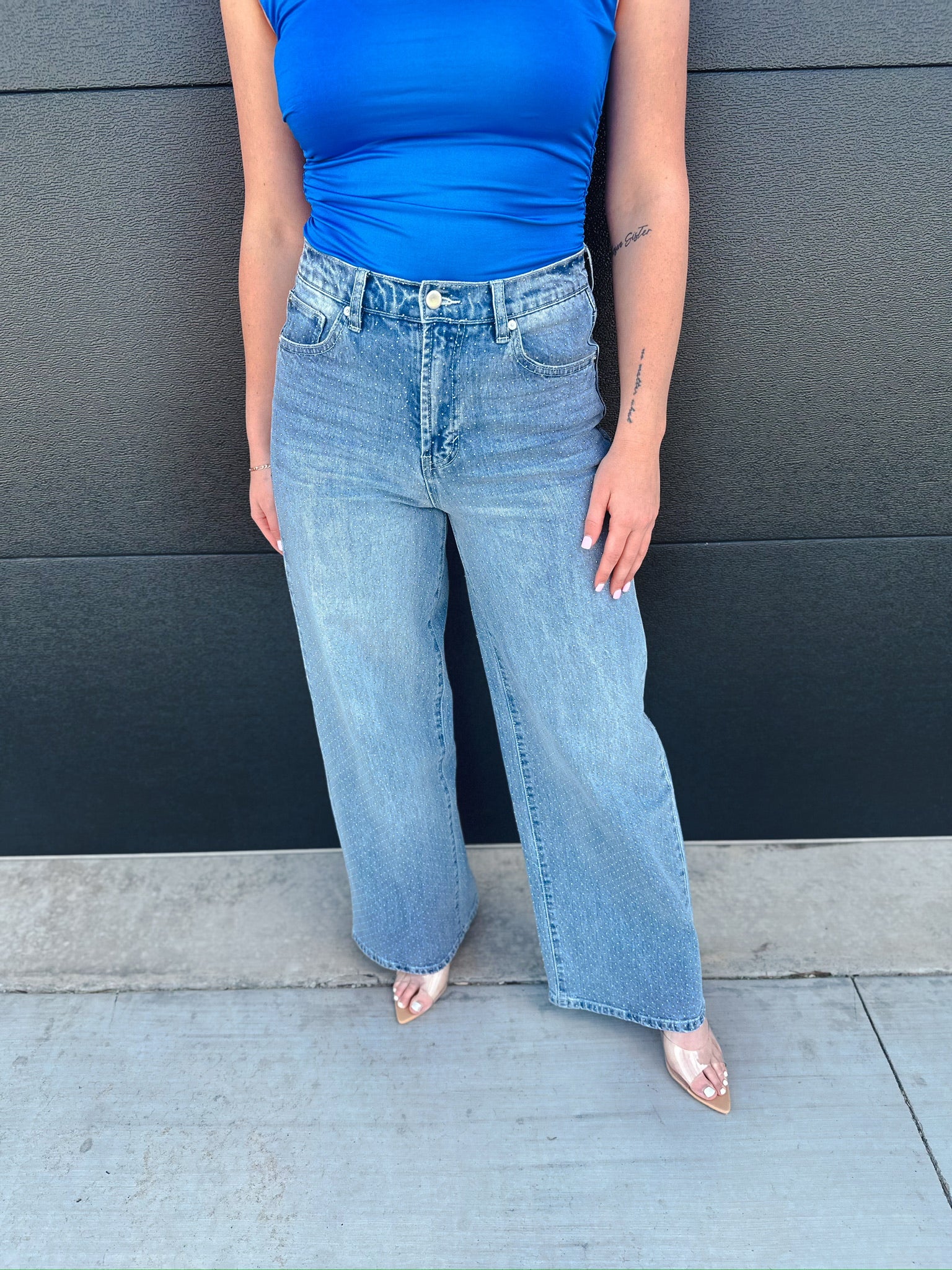 Habitual Gemma micro stud slouch wide leg jeans in light blue wash with a blue top.