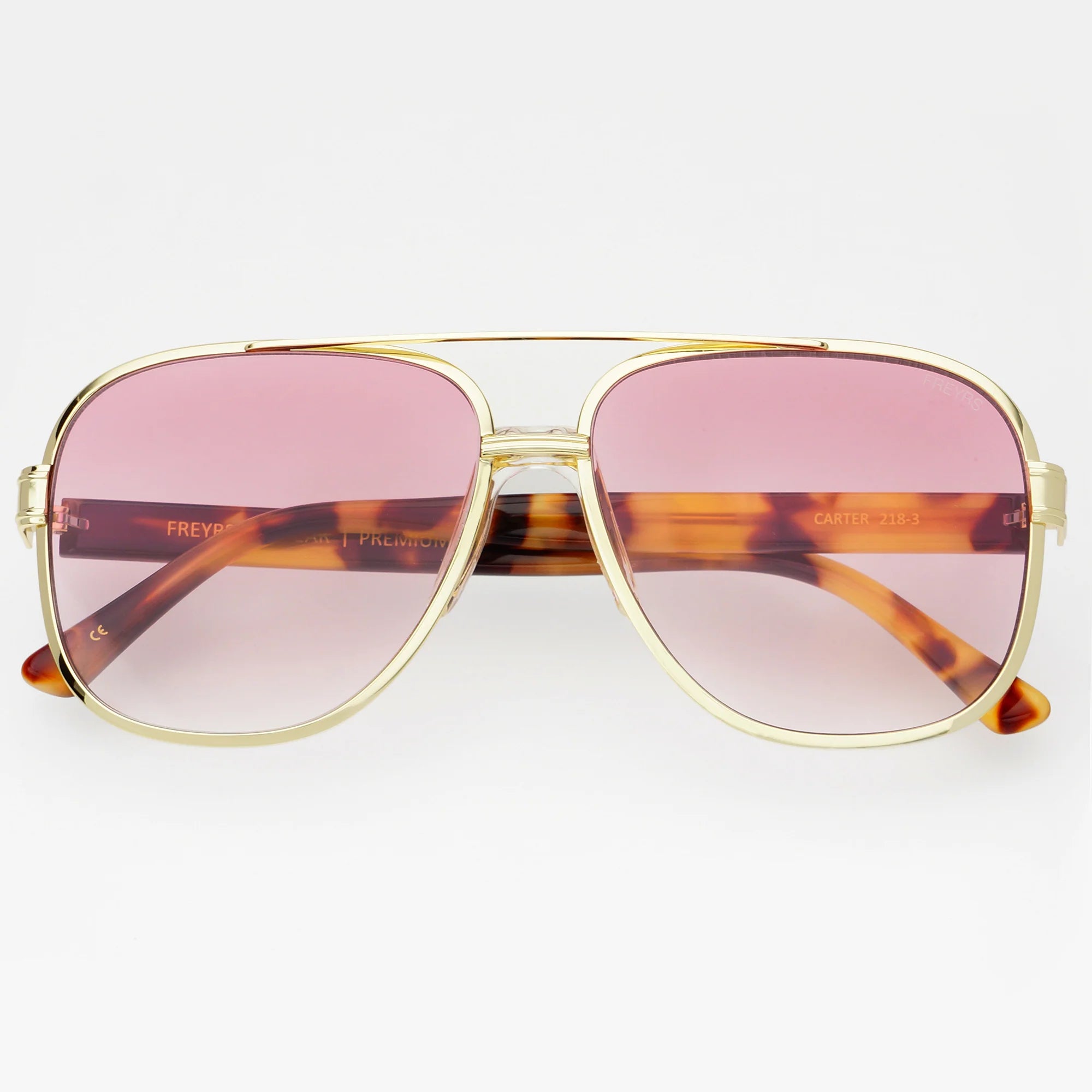 FREYRS CARTER Unisex Aviator Sunglasses with gold metal frame, pink gradient lenses, and tortoise shell arms. Model CARTER