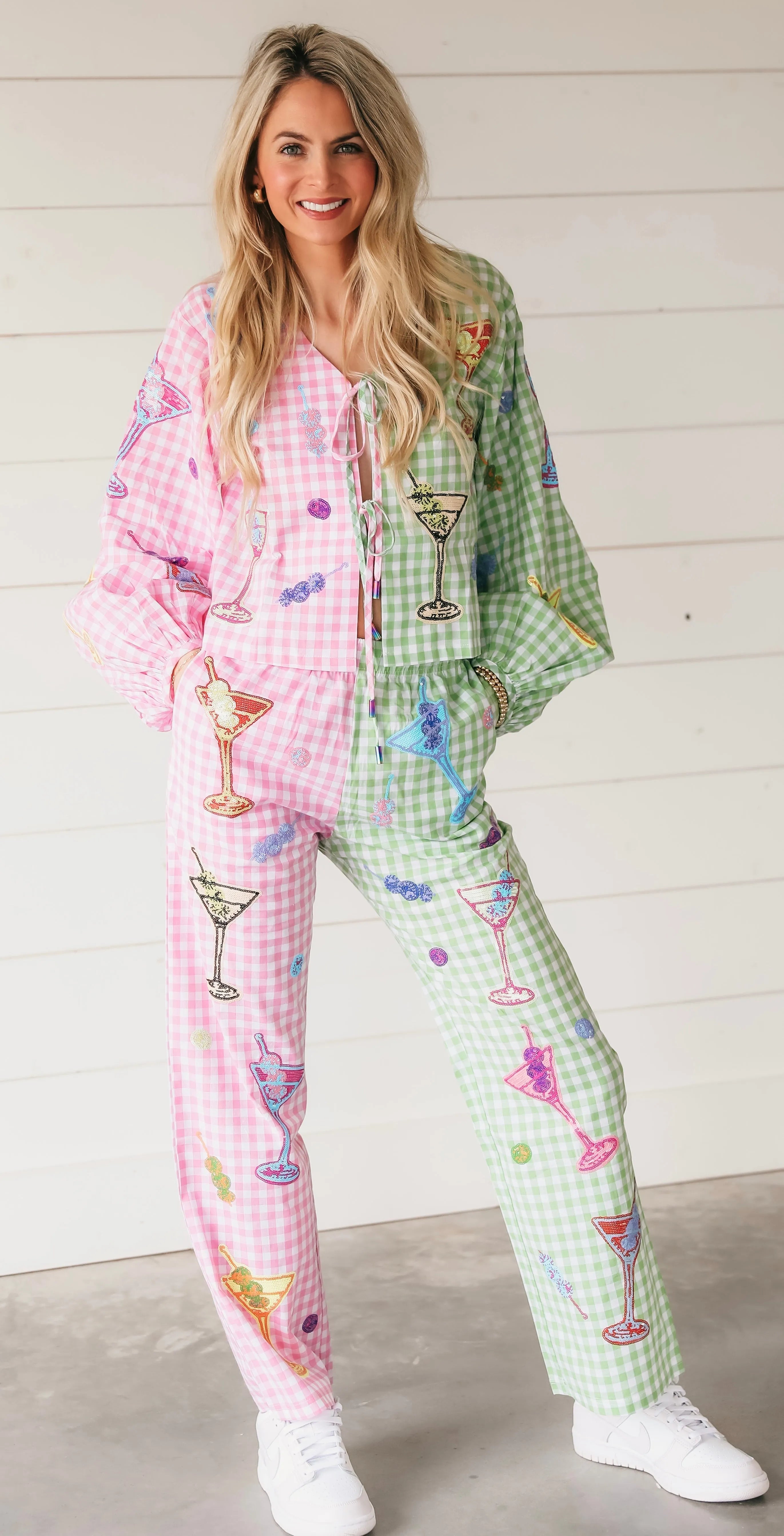 Pink and green gingham trousers with martini glass embroidery. Wide leg, tie front top. Full outfit shot.