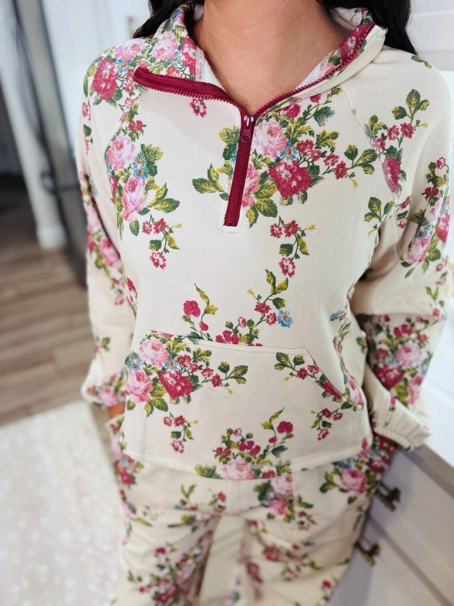 Davi & Dani Floral Half-Zip Set: Cream base with a scattered pink and red floral print. Features a burgundy zipper and trim