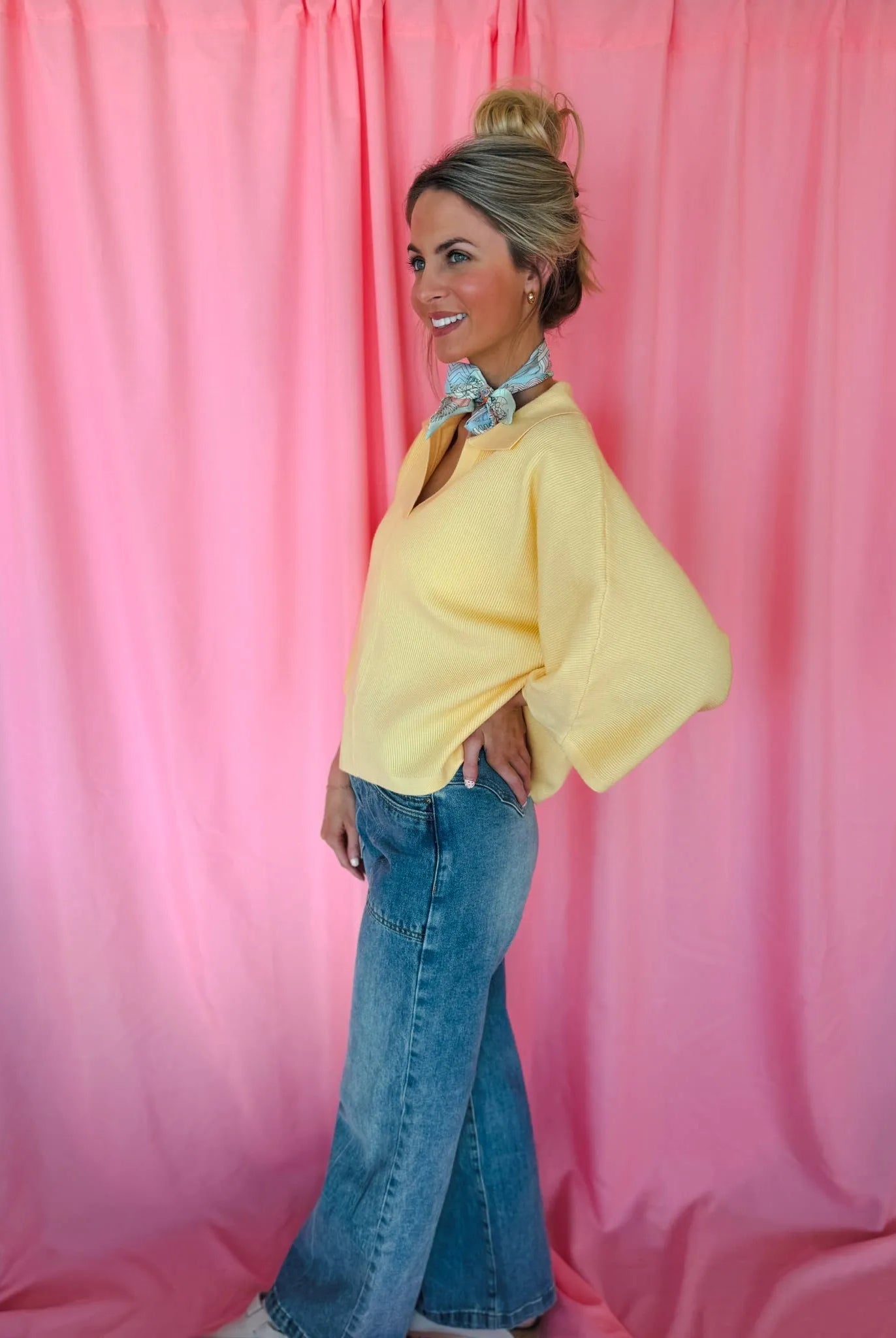 Entro Butter Yellow Ribbed Sweater Top, V-neck, wide sleeves, paired with blue jeans.