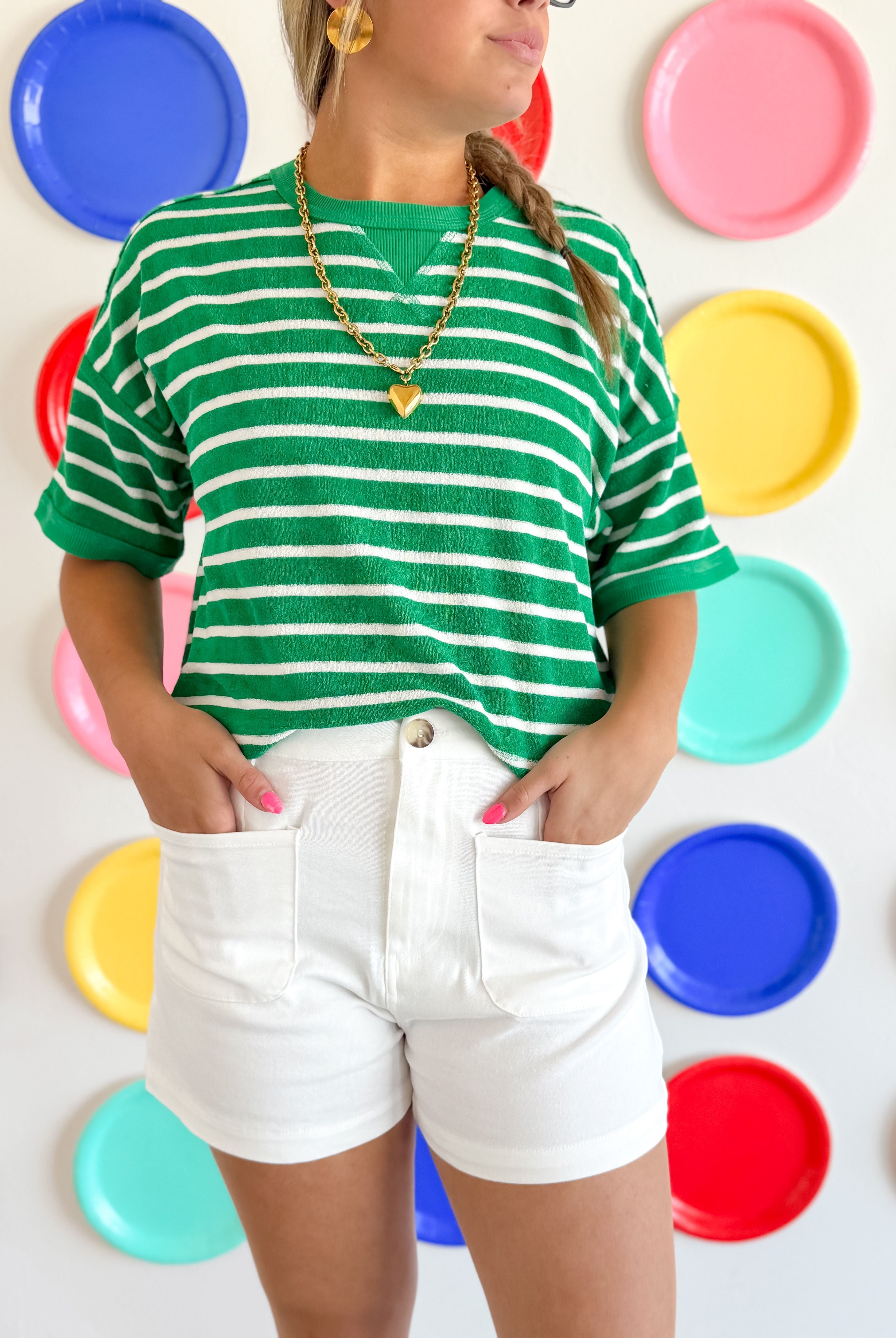 Stylish Entro White Woven Shorts displayed on a model, showcasing their comfortable fit and flattering cut, perfect for summer outfits.