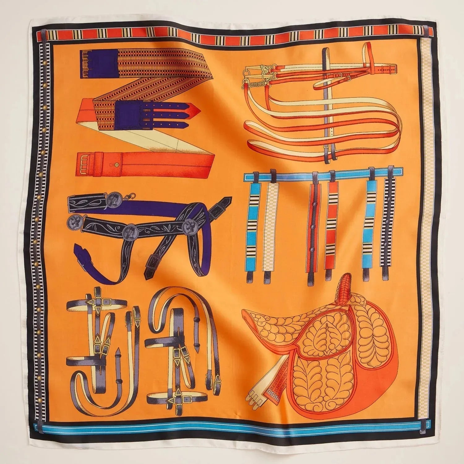 Orange silk scarf with an equestrian print featuring horse bridles, straps, and a saddle. Includes borders with geometric