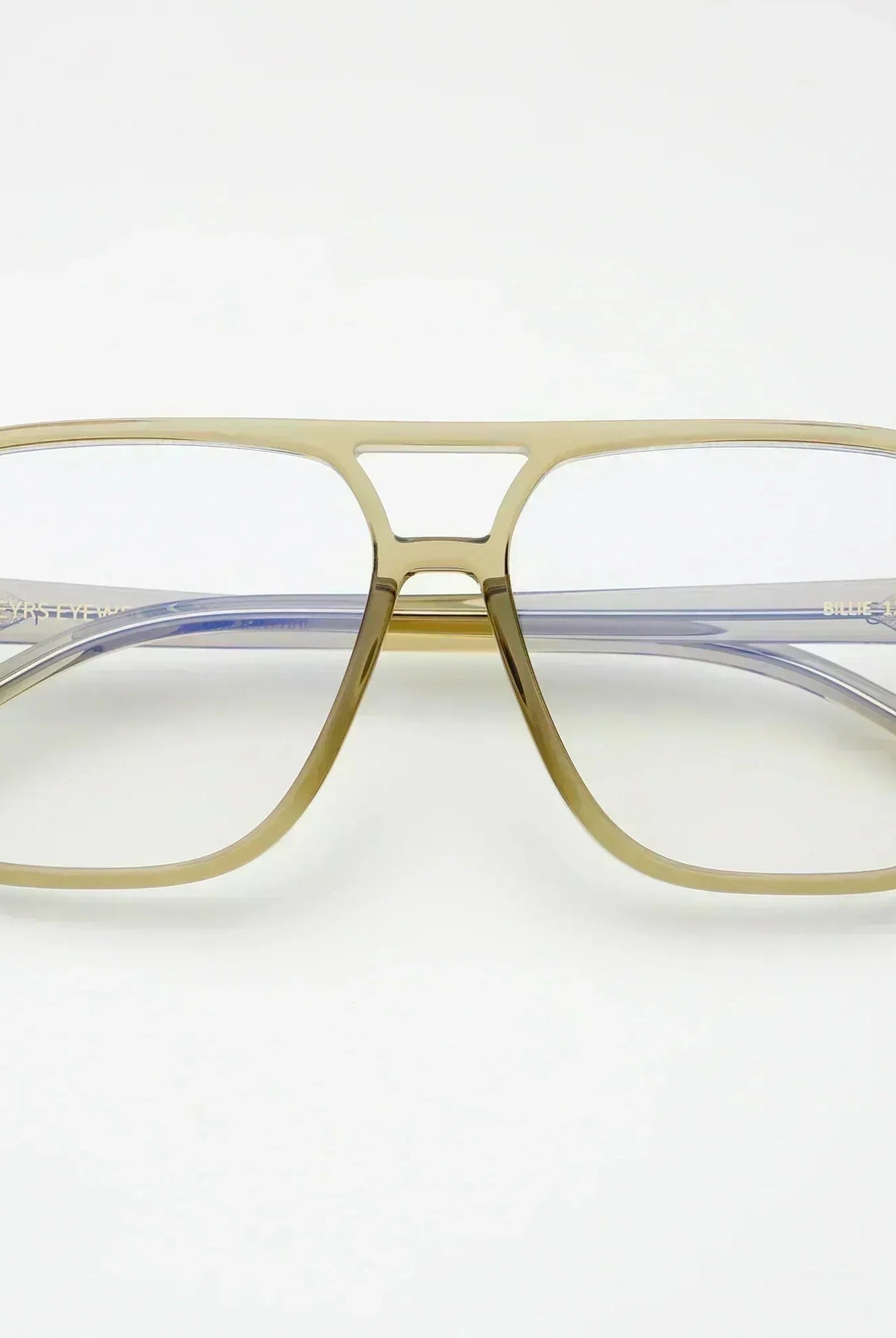 Freyrs Billie blue light filtering aviator glasses with thick tan frames and clear lenses on a white background.
