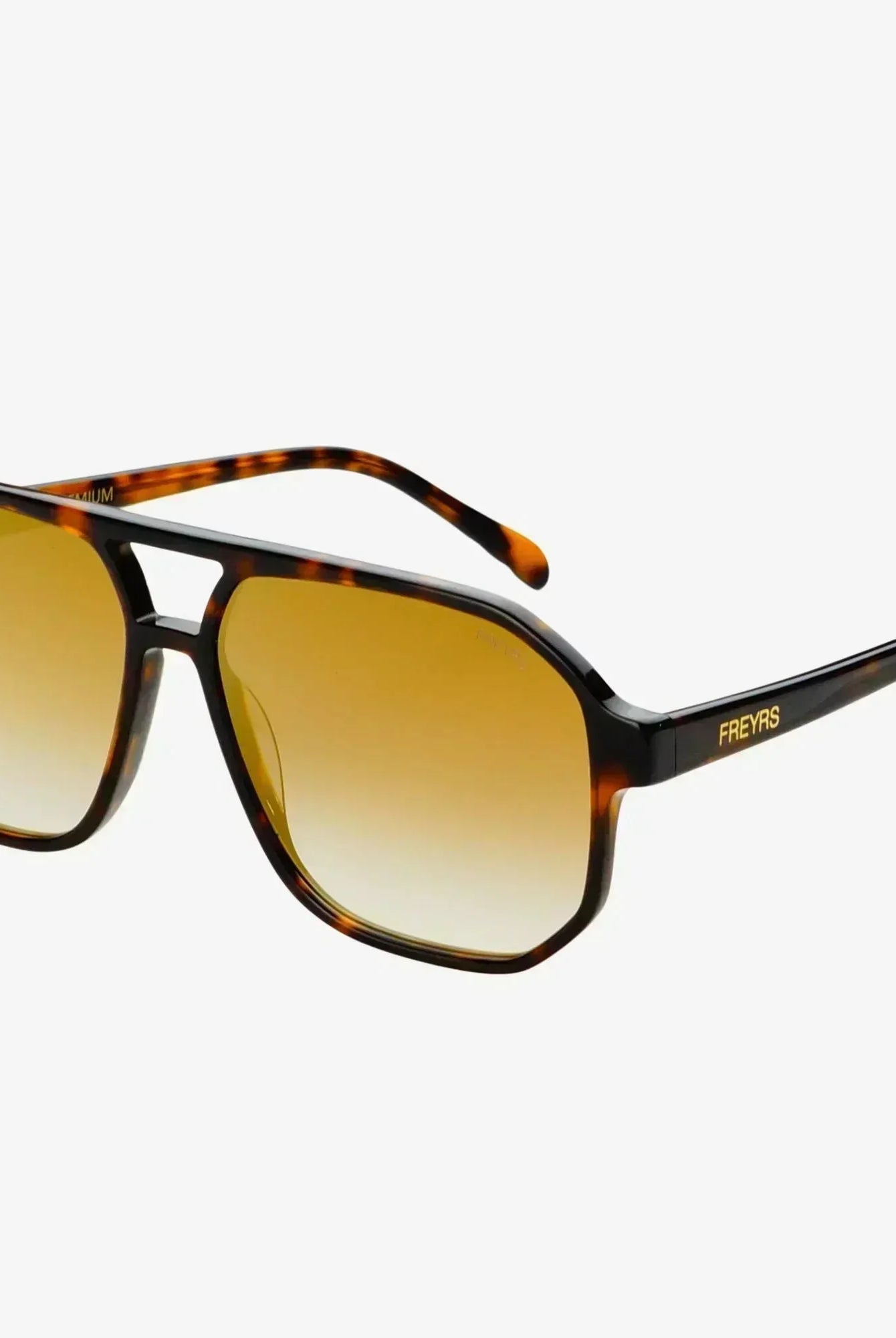 Freyrs Billie unisex aviator sunglasses with tortoise shell frames and gradient amber lenses.