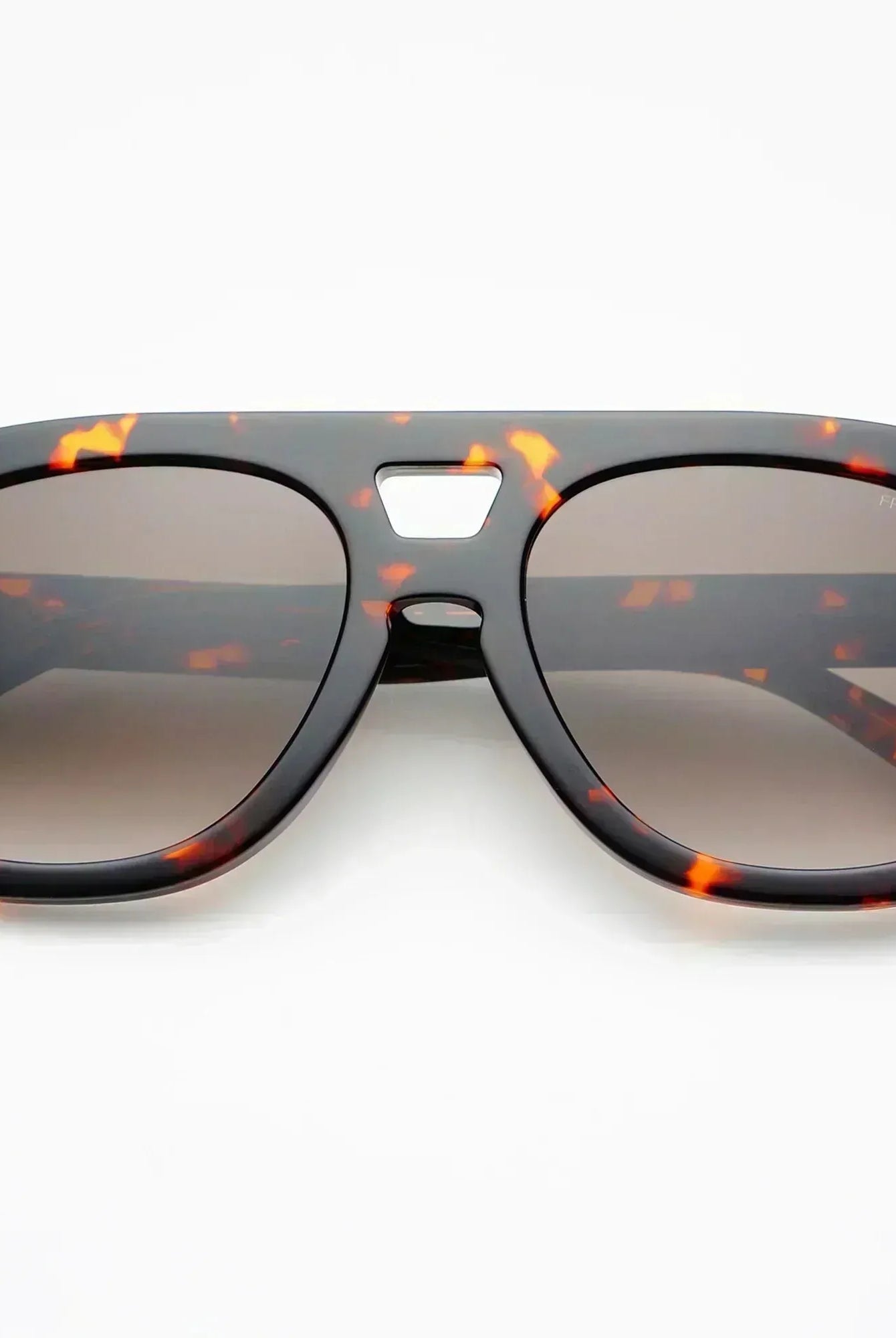 Freyrs Voyager oversized aviator sunglasses with tortoise shell frames and brown gradient lenses. White background.