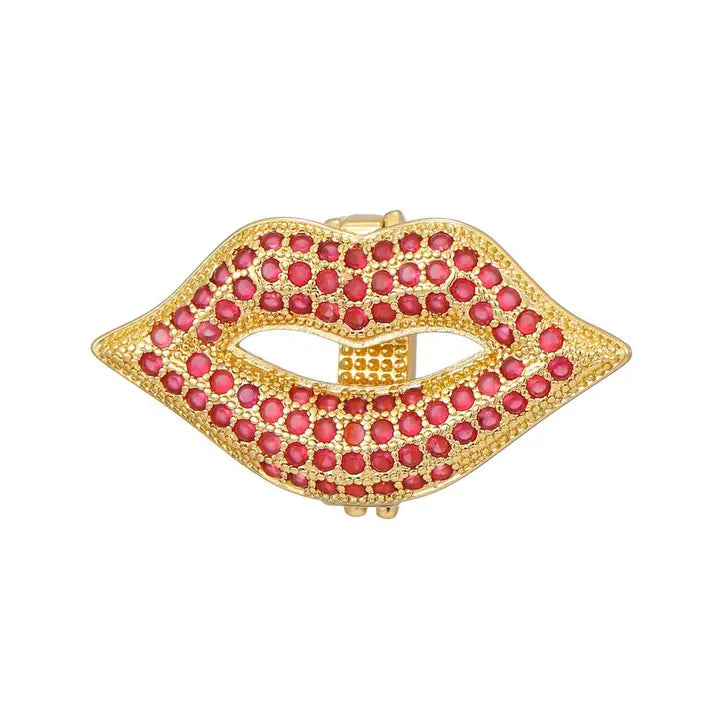 Gold plated slider charm in a kissing lips shape, encrusted with numerous small red cubic zirconia stones.