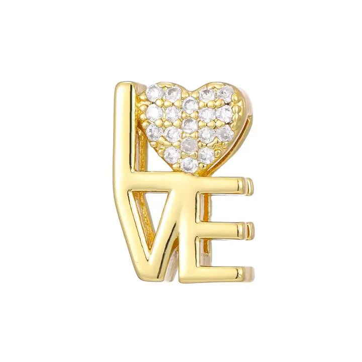 Gold plated 'LOVE' slider charm with a heart encrusted with clear cubic zirconia stones.