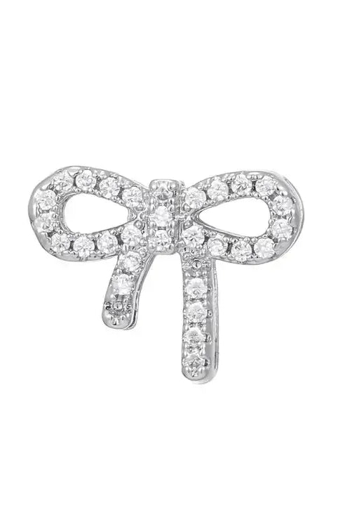 Silver plated CZ slider charm for bracelets, shaped like a sparkling bow tie with dangling ends.