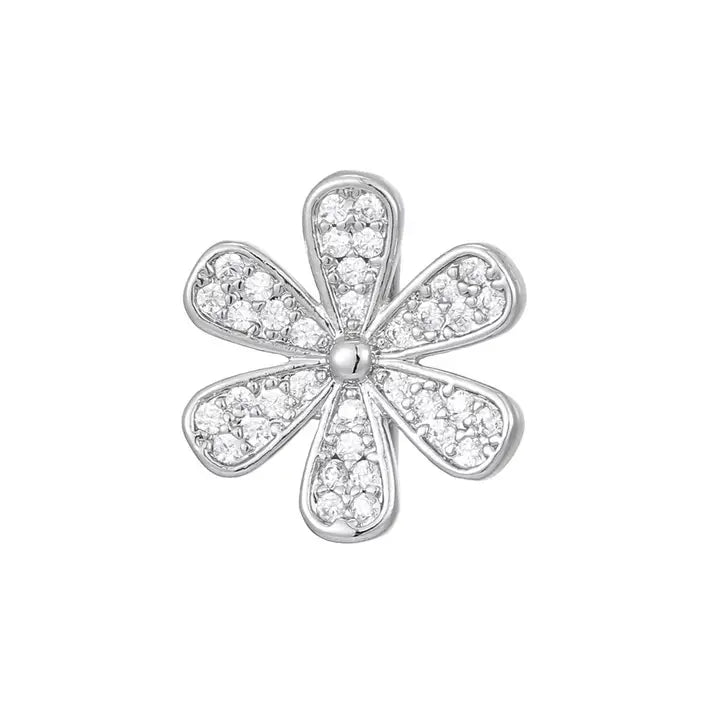 Silver flower charm with pave-set cubic zirconia (CZ) stones. Designed as a slider charm for bracelets.