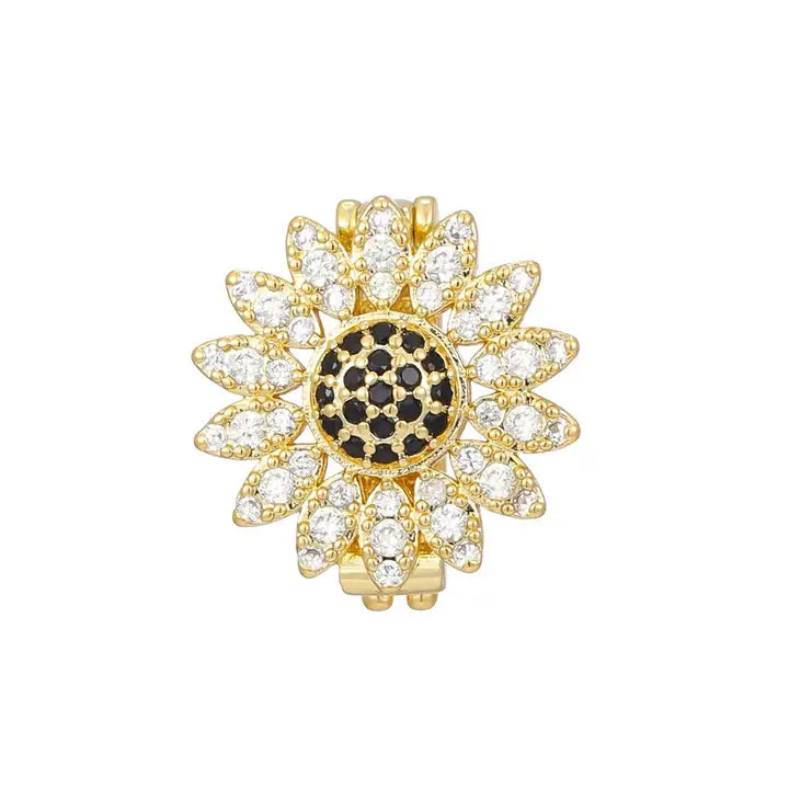 Gold plated sunflower charm with black CZ center and clear CZ petals, for bracelets.