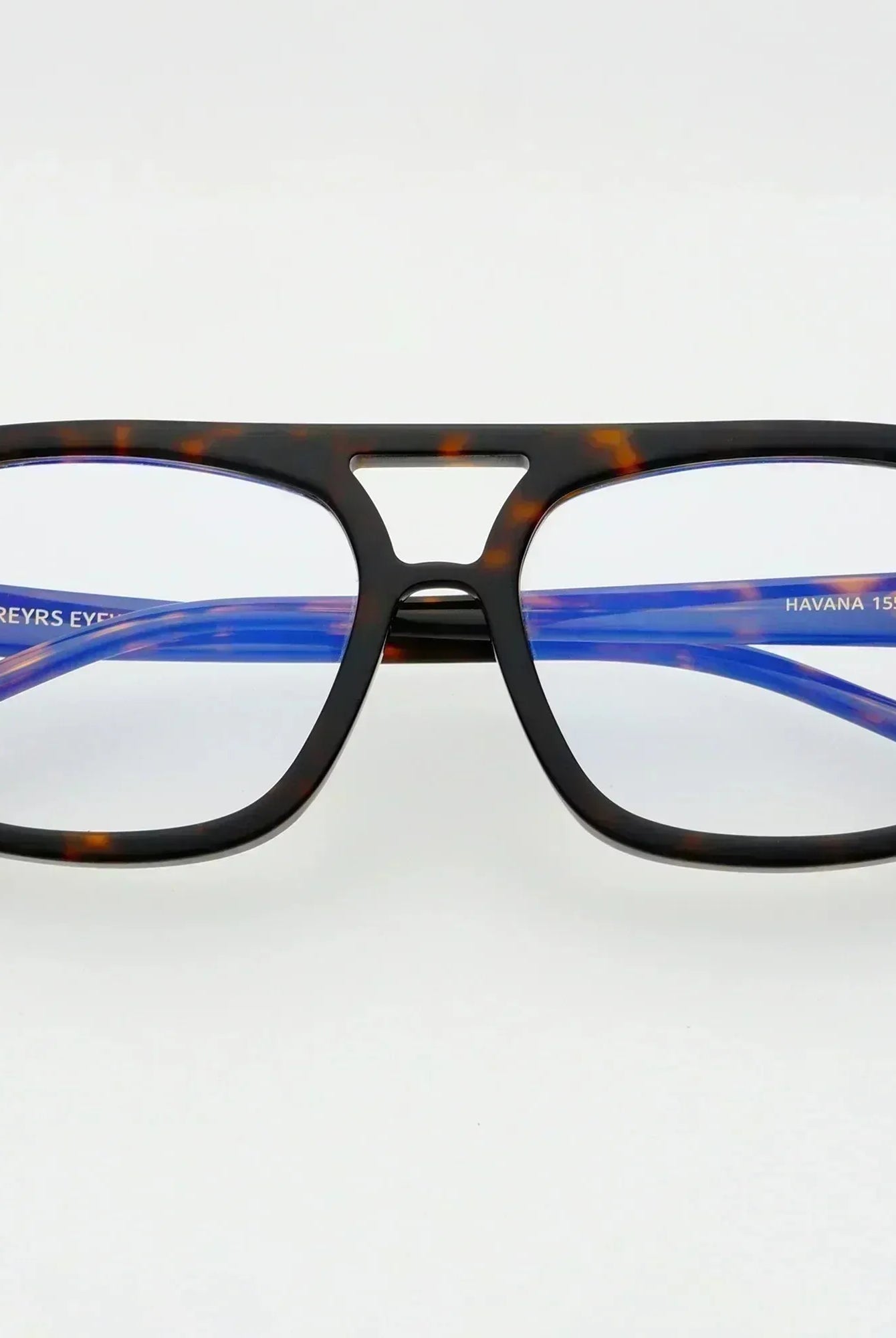 Havana aviator glasses with tortoiseshell frames and blue patterned arms. Clear lenses. Includes 'FREYRS EYE' and 'HAVANA