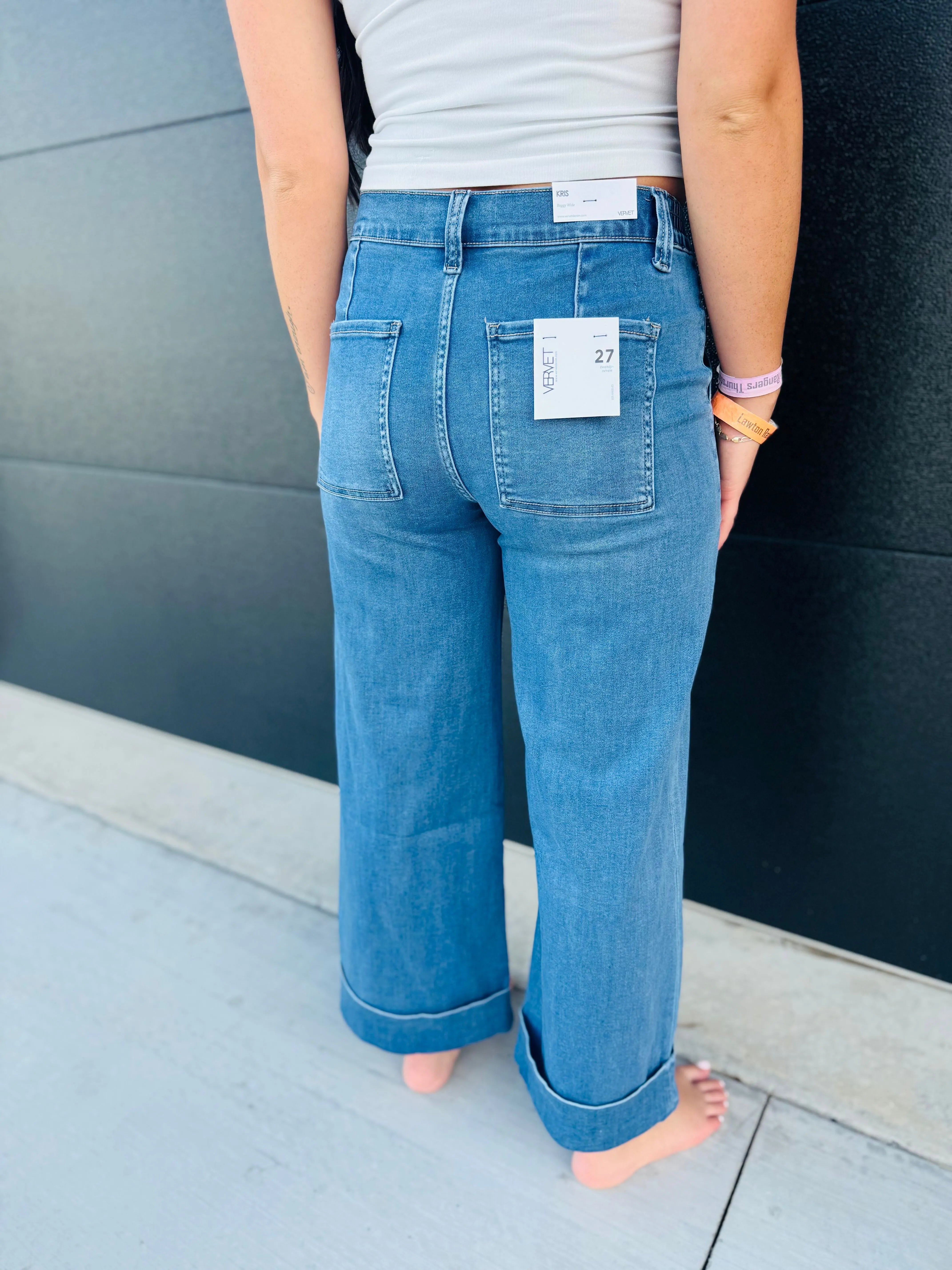 Vervet High Rise Double Cuffed Baggy Wide Jeans, back view, light blue denim with wide legs and double cuffed hems. Size 27