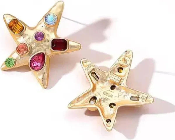 Karis Starfish Gold Statement Earrings adorned with multicolor crystals: red, pink, orange, green, and blue gems.
