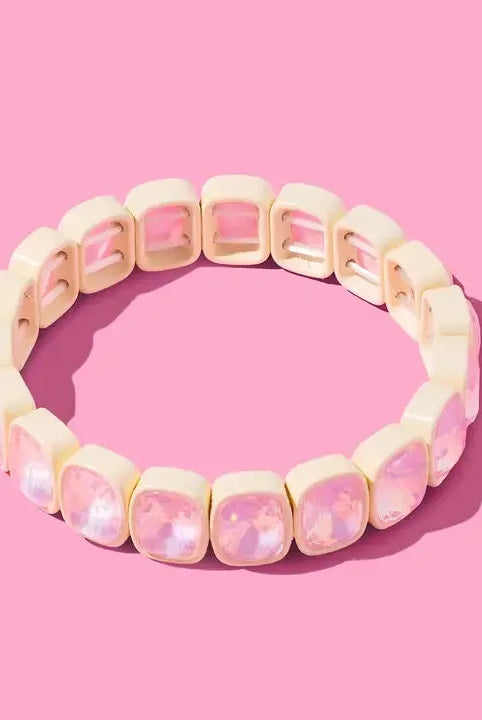 Layla enamel and stone stacking bracelet with alternating square ivory enamel beads and faceted pale pink crystal beads.