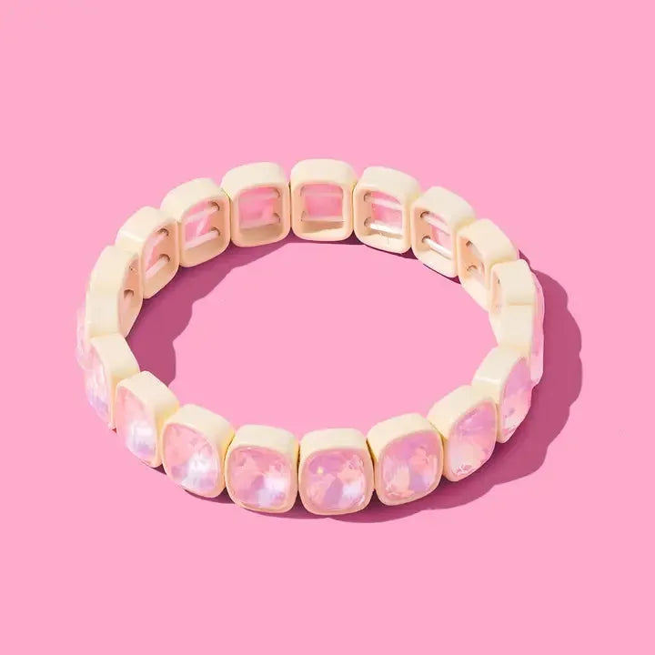 Layla enamel and stone stacking bracelet with alternating square ivory enamel beads and faceted pale pink crystal beads.