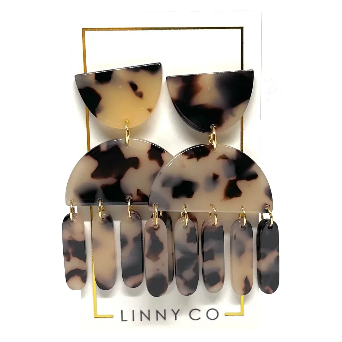 LINNY CO Sensitive Earring Collection: Dangle earrings with tortoise shell pattern. Two semi-circles on top, with six