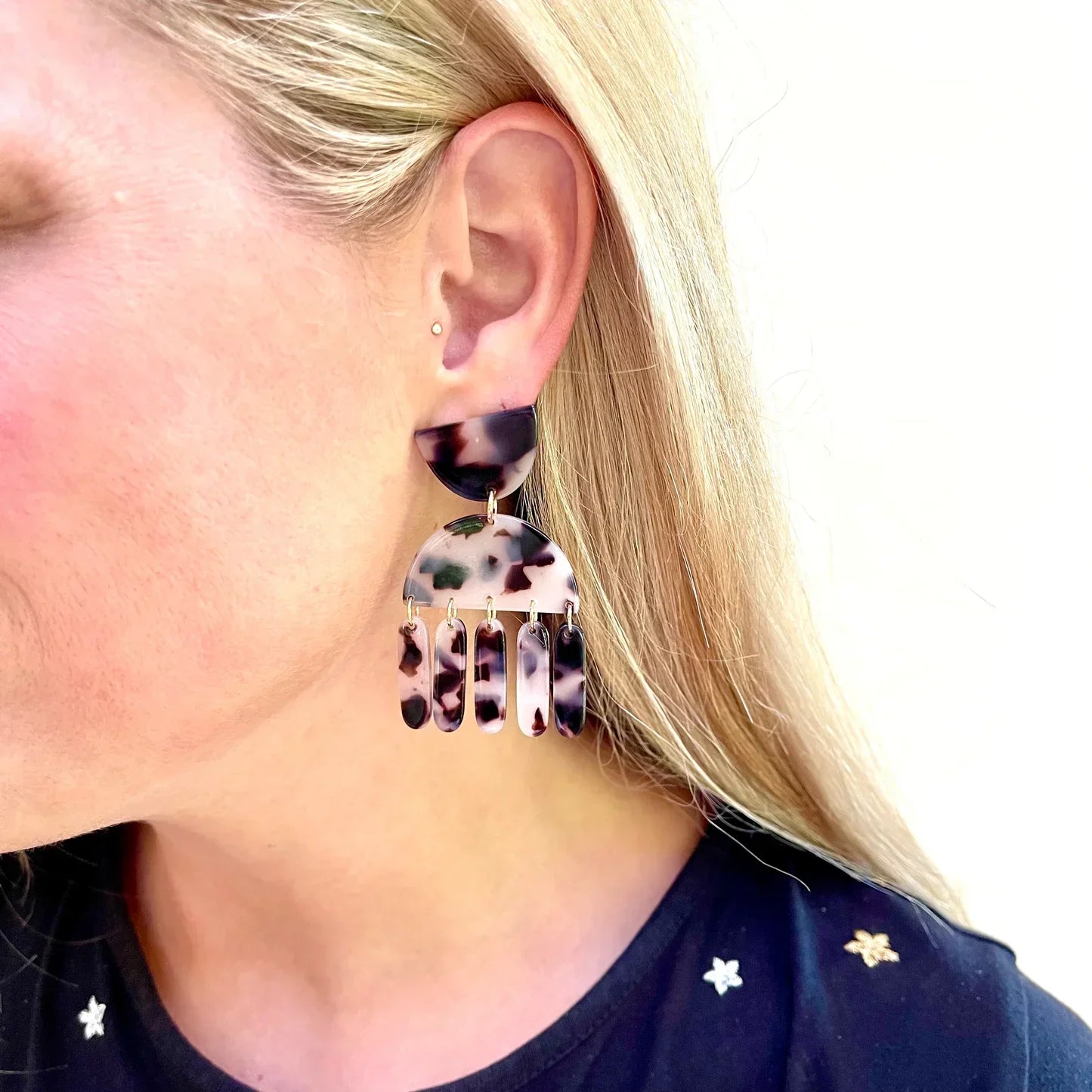 LINNY CO Sensitive Earring Collection: Multi-colored tortoiseshell dangle earrings with a half-moon top and five