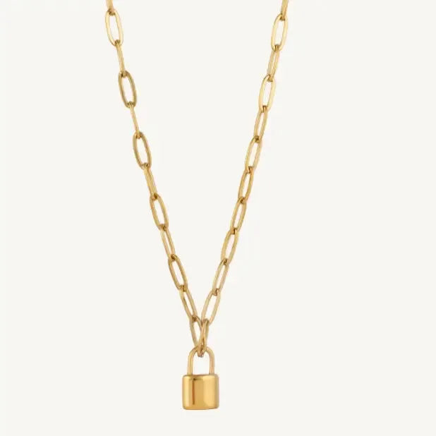 Gold chain necklace with a miniature padlock pendant. The chain features elongated oval links.