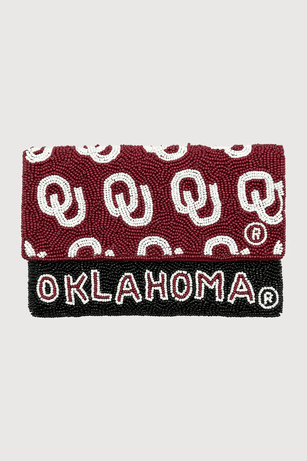 Maroon beaded clutch with white OU logos and black band with white OKLAHOMA text. Oklahoma Sooners themed accessory.