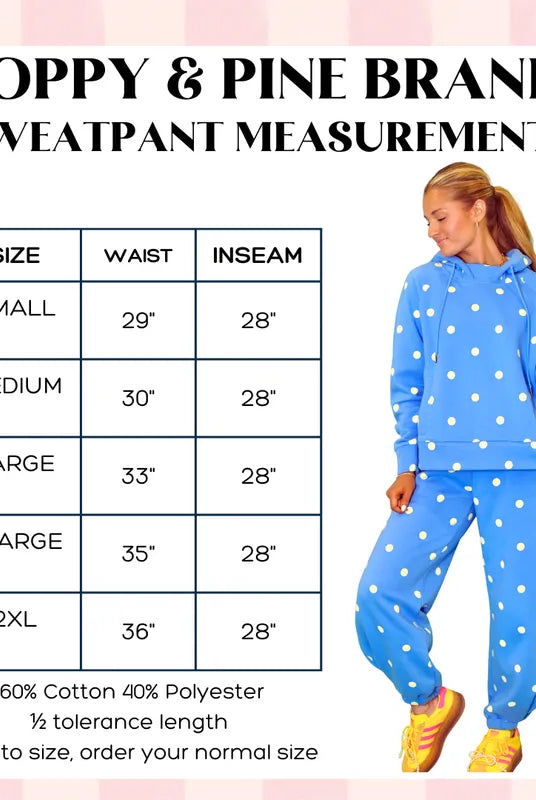 Poppy and Pine blue sweatsuit with white polka dots, modeled by a woman. Includes a size chart with waist and inseam