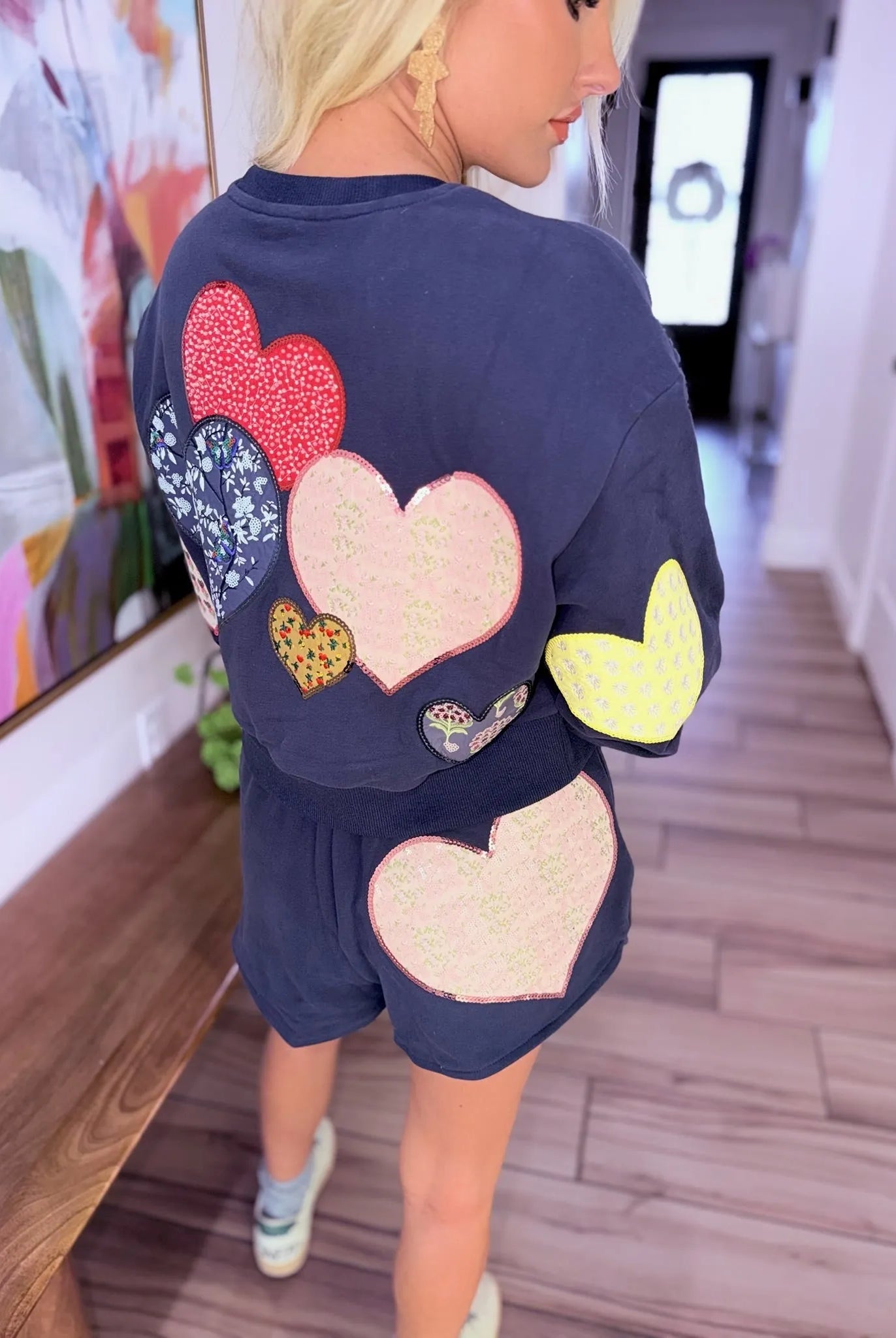 Queen of Sparkles navy jogger shorts and sweatshirt with embroidered heart appliques in various patterns and sequin