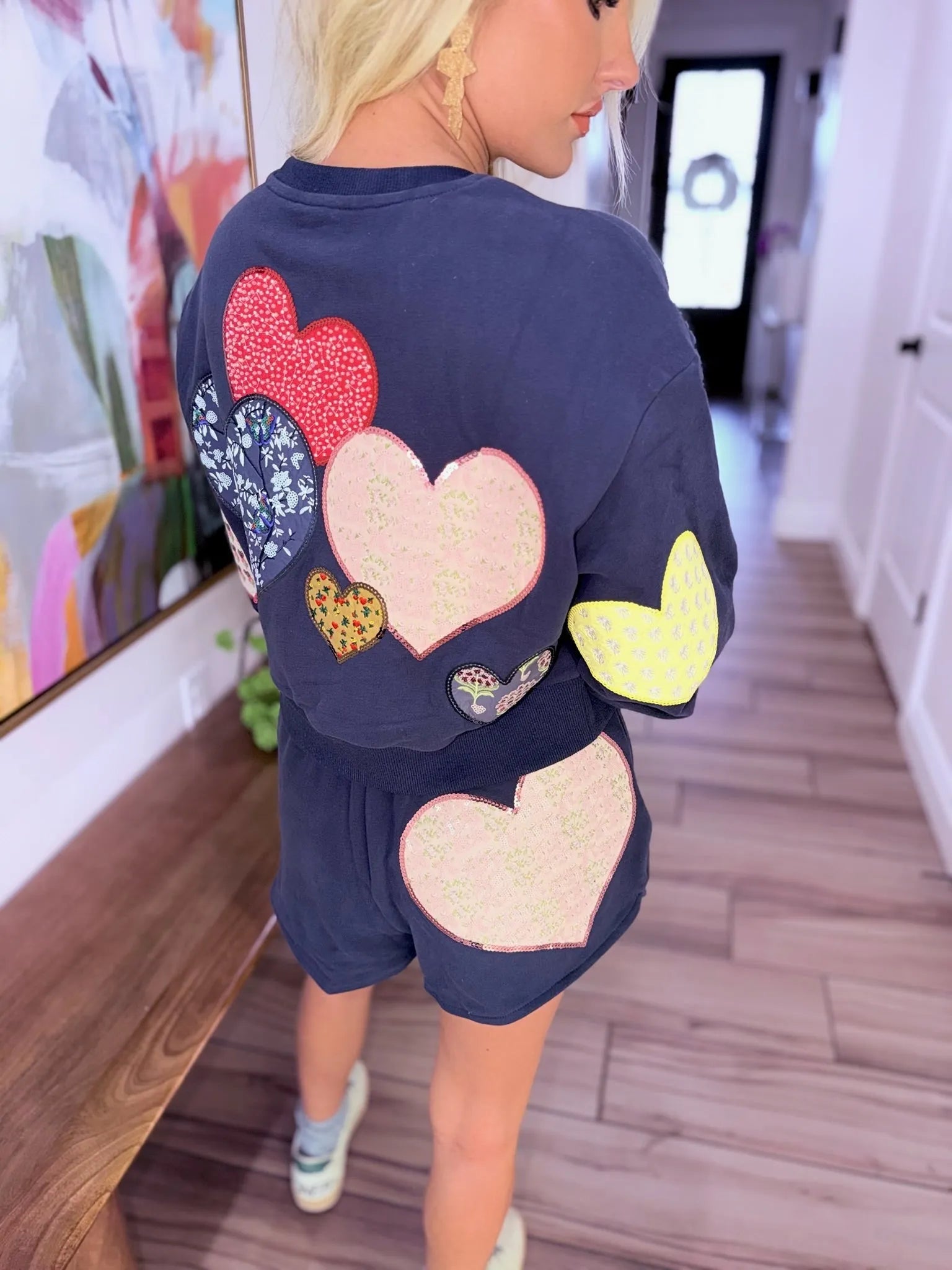 Queen of Sparkles navy jogger shorts and sweatshirt with embroidered heart appliques in various patterns and sequin