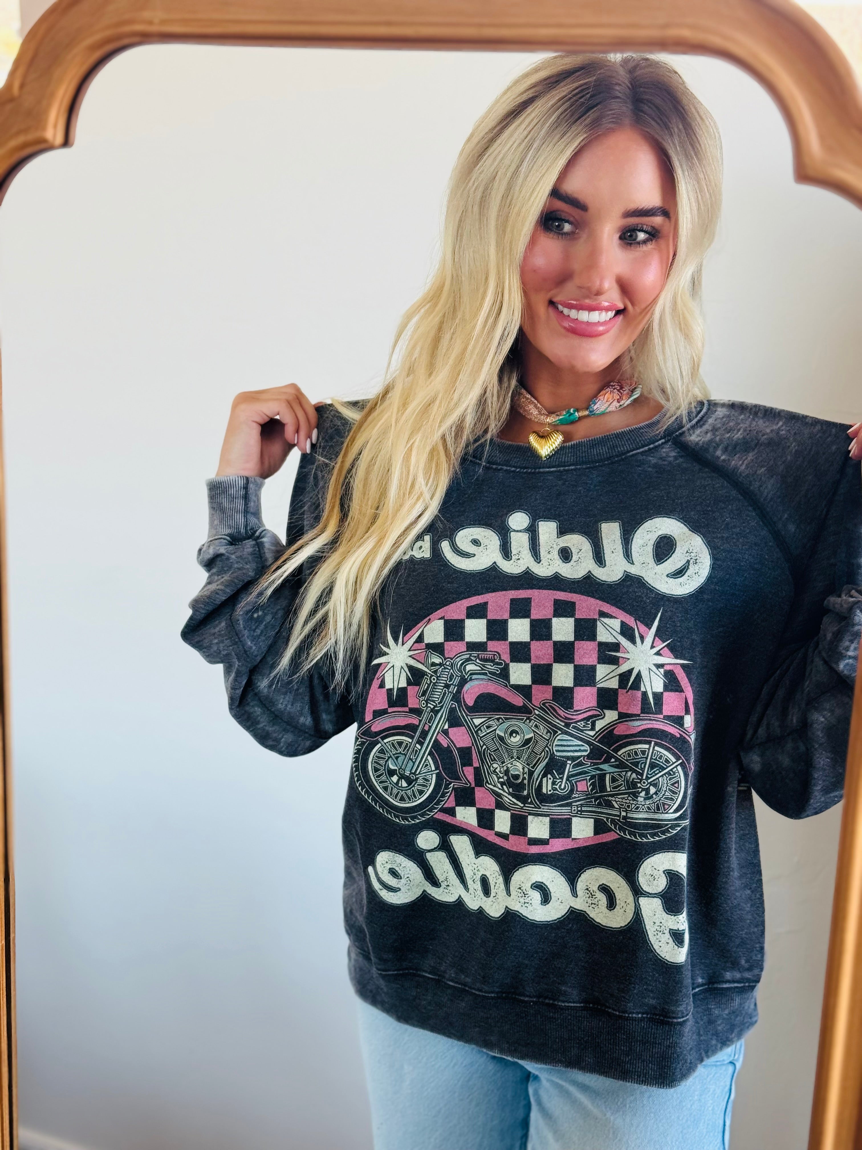 Charcoal Recycled Karma sweatshirt with "Oldie But Goodie" text and a pink checkerboard oval with a motorcycle graphic.