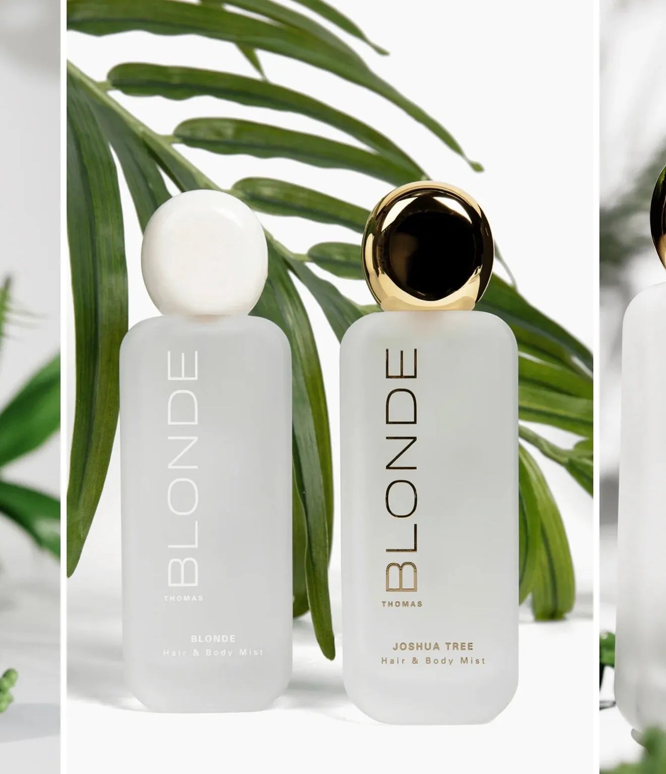 Two frosted glass bottles of Thomas Blonde Hair & Body Mist, one with a white cap, the other with a gold cap.