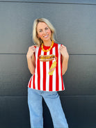Queen of Sparkles red and white striped knit tank top with hotdog and mustard graphic. Model wears light wash jeans.