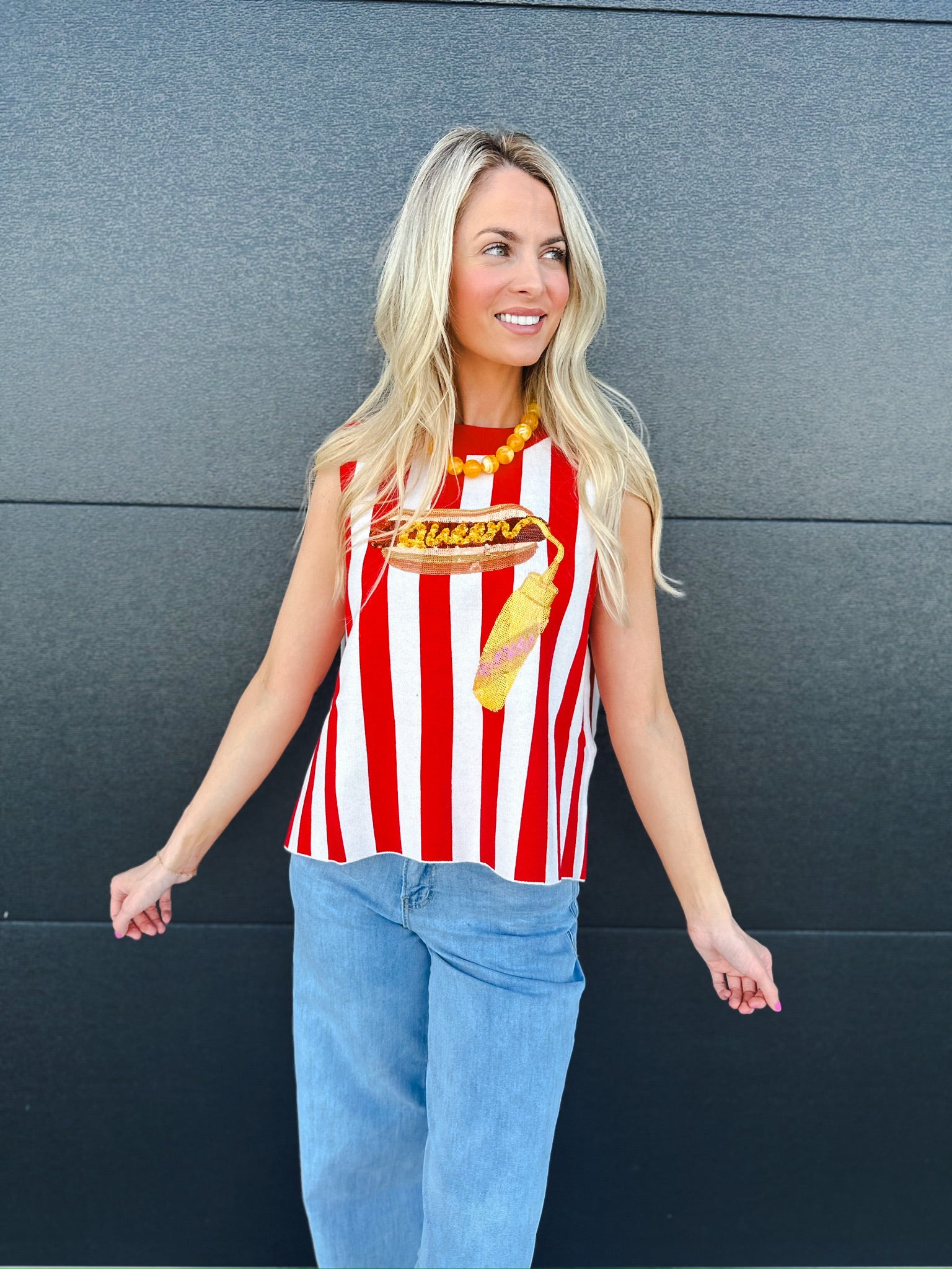 Queen of Sparkles red and white striped knit tank top with a sequined hotdog graphic and yellow mustard. Sleeveless, crew