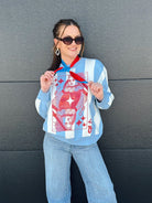 Queen of Sparkles patriotic sweater with blue and white stripes, featuring a red Queen of Hearts card graphic.