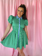 Entro green and white stripe contrast puff sleeve dress with blue vertical stripe placket and gathered waist.