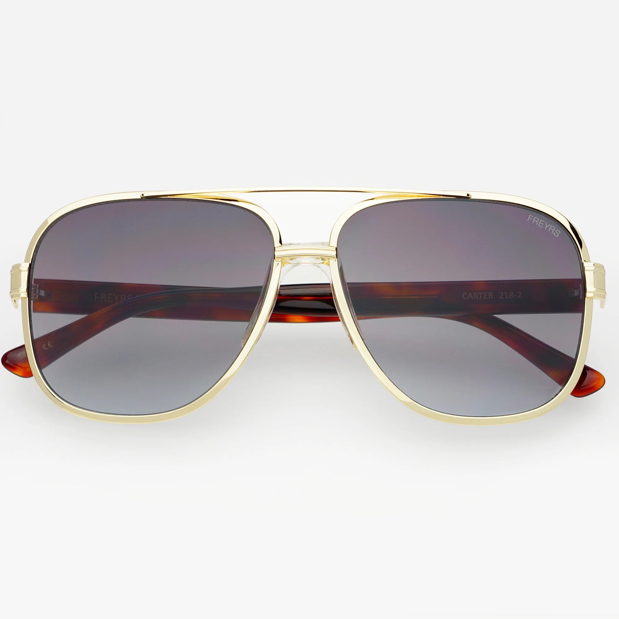 FREYRS CARTER unisex aviator sunglasses with gold metal frame, tortoise shell arms, and gradient grey lenses.