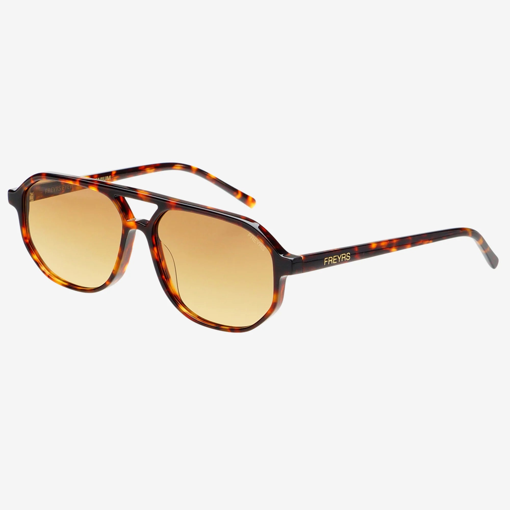 FREYRS FENIX-BROWN sunglasses with tortoise shell frames and gradient amber lenses. The brand name "FREYRS" is visible on