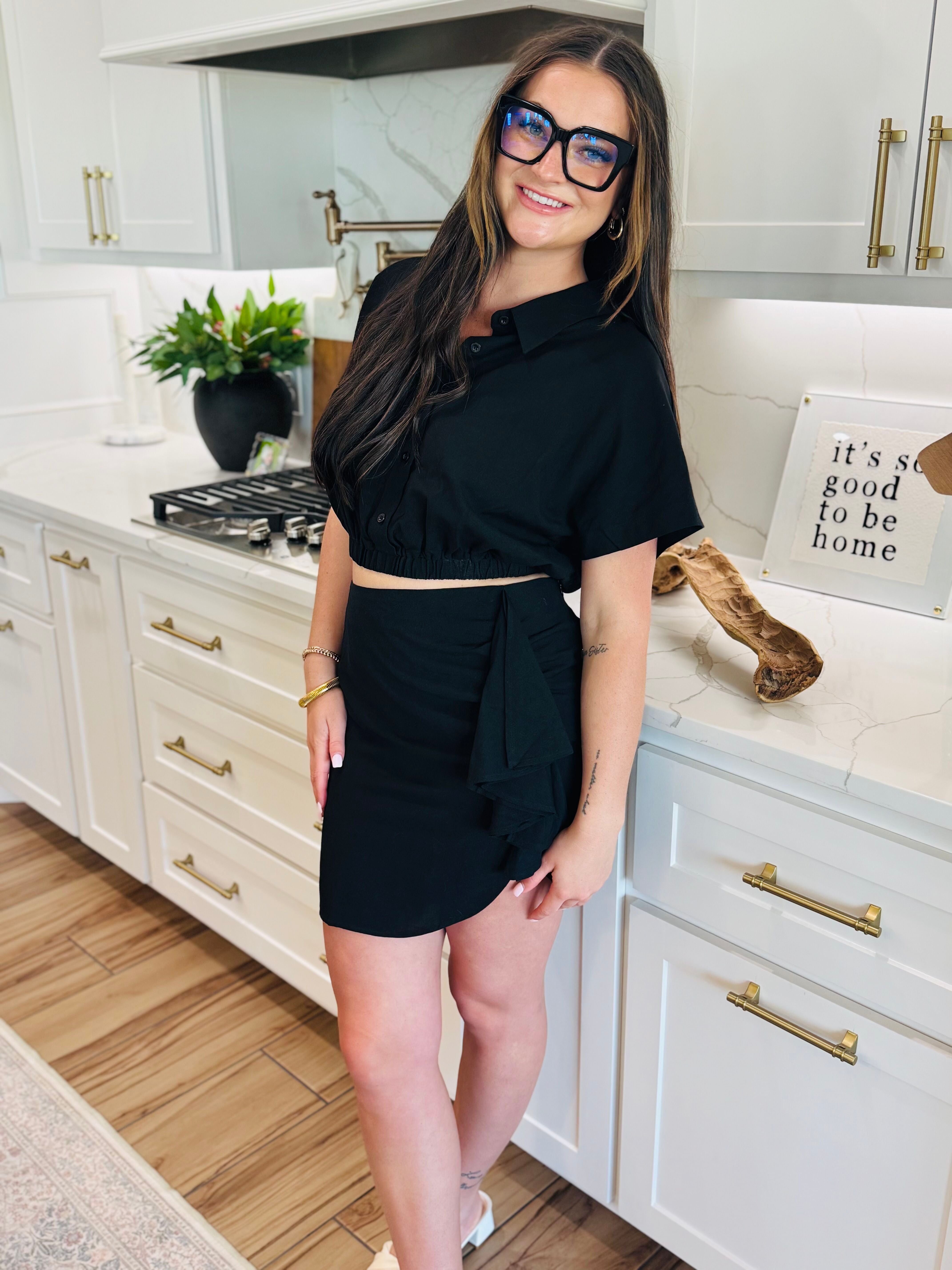 BLACK LINEN TWO PIECE SKIRT SET - Chic image of model wearing black linen two piece skirt set, perfect for any occasion, highlighting fashionable appeal.