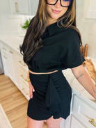 BLACK LINEN TWO PIECE SKIRT SET - Elegant black linen skirt and top ensemble perfect for dressing up or down, showcasing versatility and sophistication.