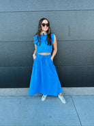 BLUE SLEEVELESS TOP AND SKIRT SET