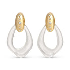 Clear acrylic drop earrings with gold-tone oval tops encrusted with small rhinestones.