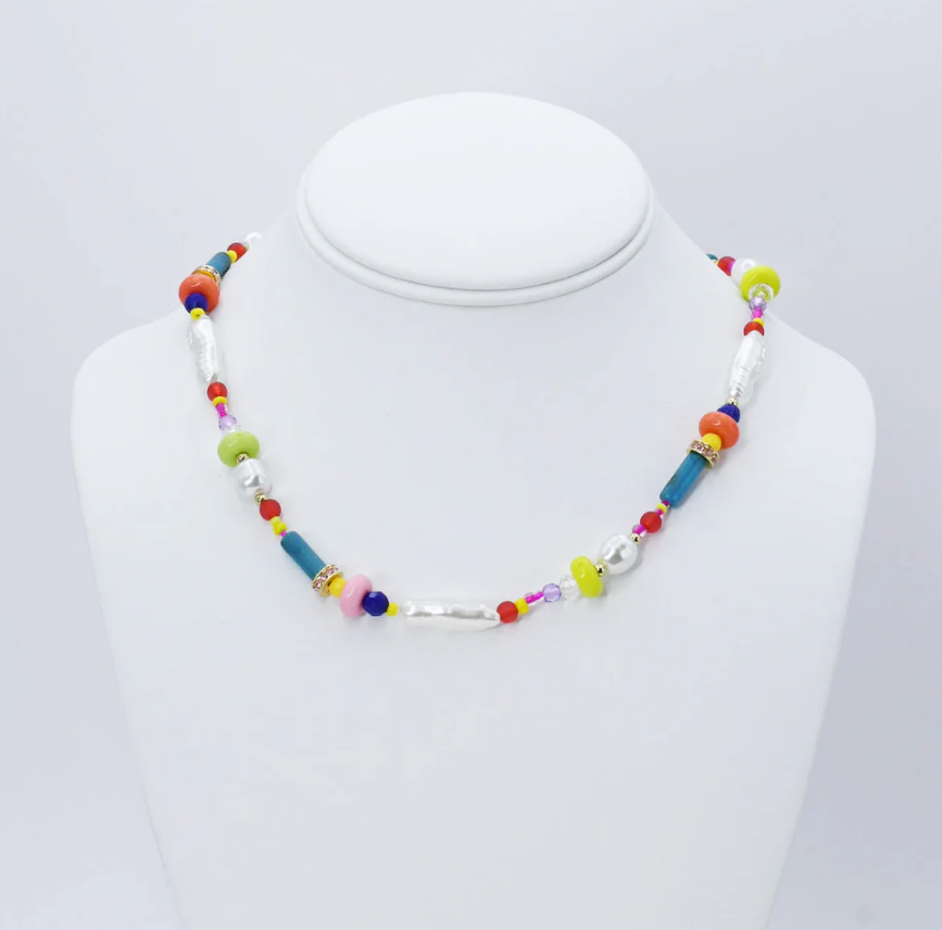 BEAD AND BLOOM NECKLACE featuring colorful beads for a statement piece, perfect for layering or wearing solo.