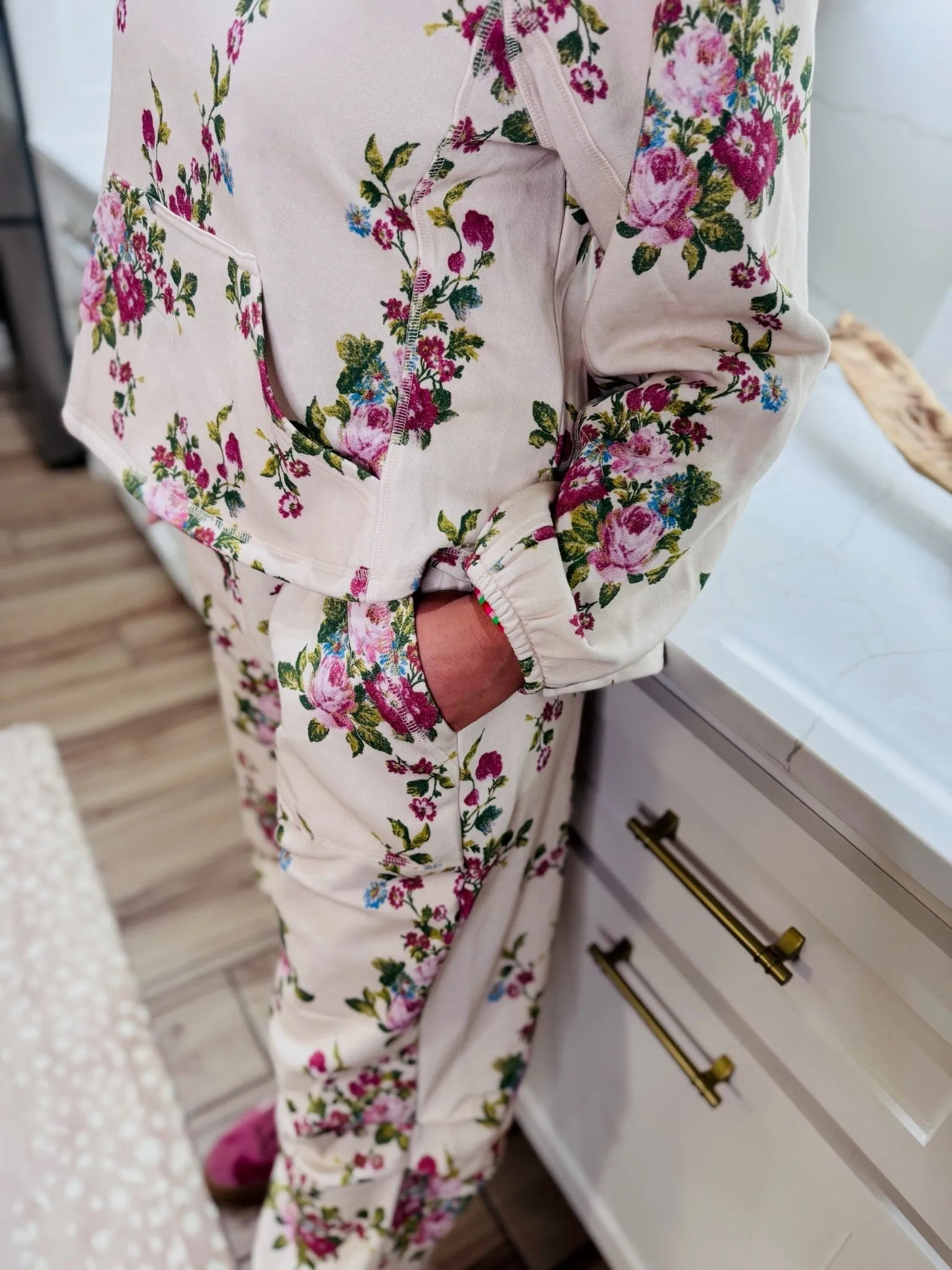 Davi & Dani Floral Half-Zip Set: Cream-colored loungewear with a vibrant floral print of pink roses, blue flowers, and