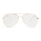 Gold aviator-style blue light blocking glasses with oversized clear lenses, on a white background.