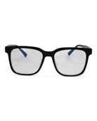 DAX Spruce blue light blocking glasses featuring large, modern black frames and clear lenses. Visible DAX logo on left arm.
