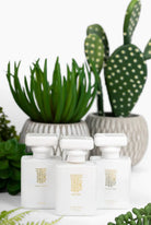 Three white Eau de Parfum bottles by Thomas Blonde with gold logos. "Sweet Yucca", "Blonde", and "Joshua Tree" scents