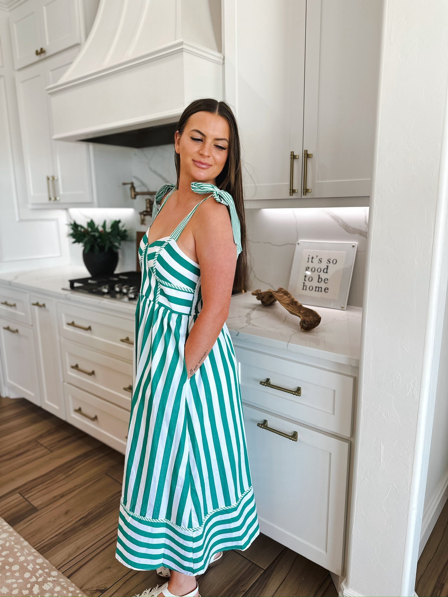 Entro green and white striped midi dress with tie straps and pockets.