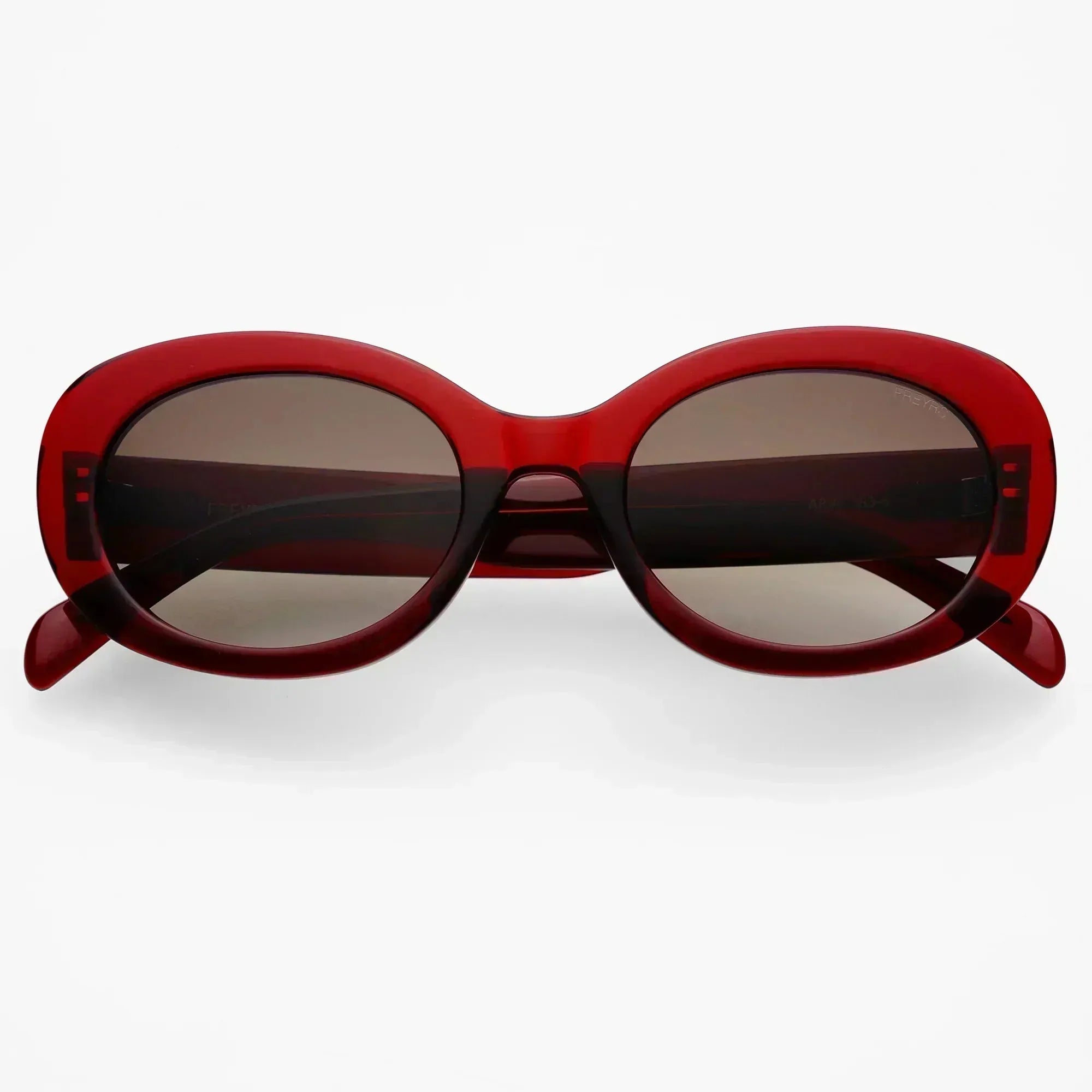 Freyrs Aria womens classic red acetate oval sunglasses with brown tinted lenses, on a white background.