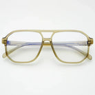 Freyrs Billie blue light filtering aviator glasses with thick tan frames and clear lenses on a white background.