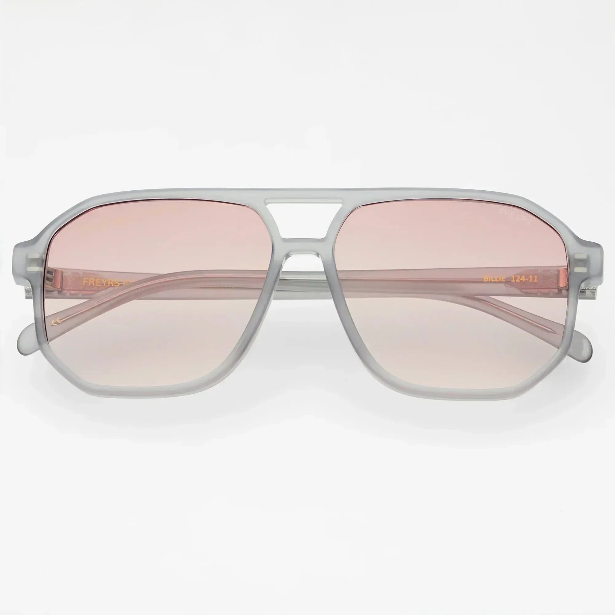 Freyrs Billie Unisex Aviator Sunglasses with light grey frames and gradient pink lenses. Model number "Billie 124-11" is