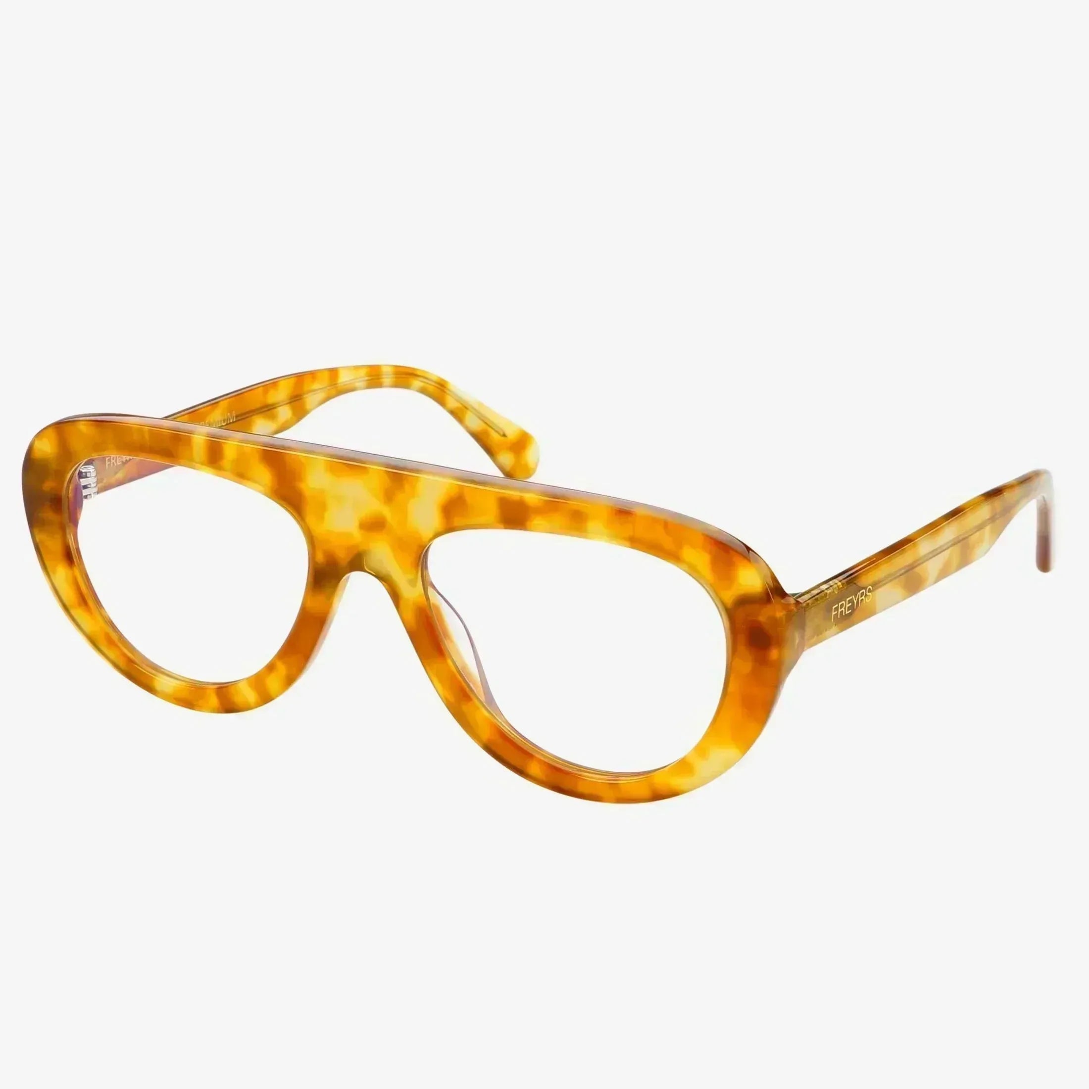 Freyrs Jetsetter blue light filtering reading glasses with a tortoise shell frame and clear lenses.