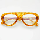 Freyrs Jetsetter blue light filtering reading glasses with thick tortoise shell frames and clear lenses.